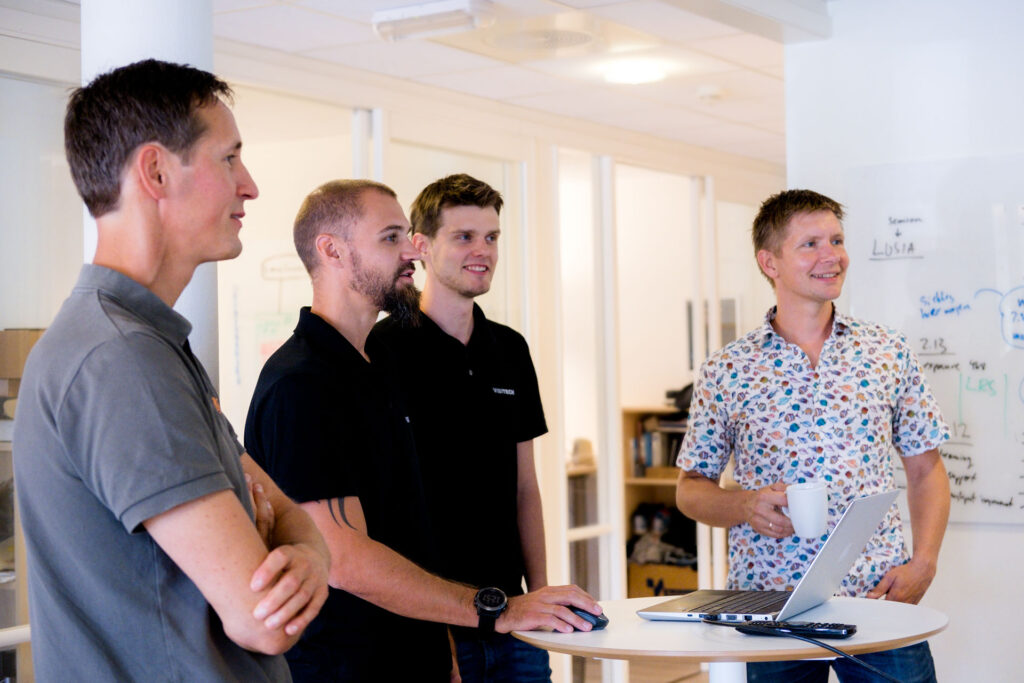 Employees having a stand up meeting